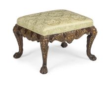 A CARVED WALNUT AND PARCEL GILT STOOL, IRISH, IN GEORGE II STYLE, SECOND HALF 19TH CENTURY