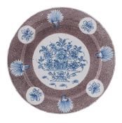 AN ENGLISH DELFT BLUE AND MANGANESE PLATE, POSSIBLY BRISTOL, MID 18TH CENTURY