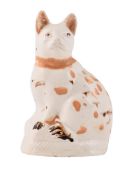 A STAFFORDSHIRE CREAMWARE MODEL OF A SEATED CAT, CIRCA 1780