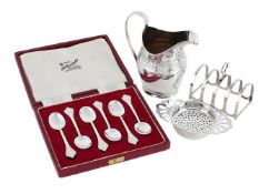 A GEORGE III SILVER OVAL CREAM JUG AND OTHER ITEMS