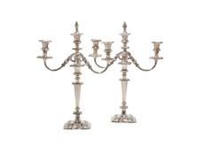 A PAIR OF SILVER PLATED THREE LIGHT CANDELABRA