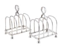 A PAIR OF SILVER FOUR DIVISION TOAST RACKS