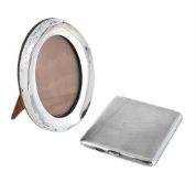 A SILVER RECTANGULAR CIGARETTE CASE