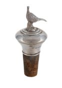 A SILVER MOUNTED BOTTLE STOPPER