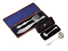 A CASED PAIR OF VICTORIAN SILVER FISH SERVERS AND TWO SIFTING SPOONS