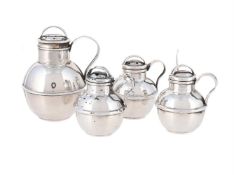 A SILVER THREE PIECE JERSEY CREAM CAN CRUET SET AND A LARGER PEPPERETTE