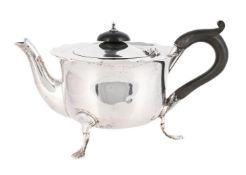 A SILVER SHAPED CIRCULAR BACHELOR'S TEAPOT