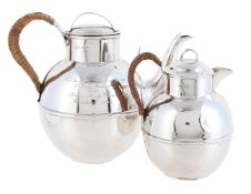 AN EDWARDIAN SILVER JERSEY CAN FORM TEA POT AND CREAM JUG