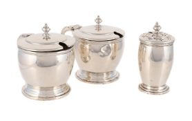 A SILVER THREE PIECE CRUET SET