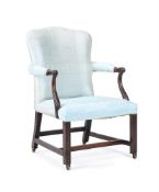 A GEORGE III MAHOGANY AND UPHOLSTERED LIBRARY ARMCHAIR, CIRCA 1765