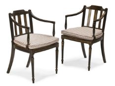 A PAIR OF REGENCY EBONISED AND PARCEL GILT OPEN ARMCHAIRS, FIRST QUARTER 19TH CENTURY