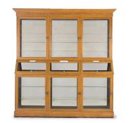 A SCUMBLED PINE AND GLASS PHARMACY OR HERBALISTS SHOP CABINET, FRENCH, CIRCA 1900
