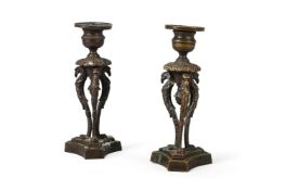 A PAIR OF GEORGE IV BRONZE CANDLESTICKS, CIRCA 1820
