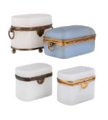 THREE OPAQUE-WHITE FROSTED GLASS AND GILT-METAL MOUNTED CASKETS, ALONG WITH ANOTHER SIMILAR