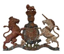 A LARGE CAST IRON AND PAINTED BRITISH ROYAL COAT OF ARMS, PROBABLY LAST QUARTER 19TH CENTURY