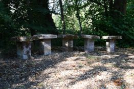 A MATCHED SET OF FIVE STADDLE STONES, PROBABLY 20TH CENTURY