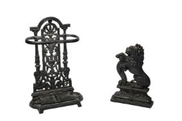 A SMALL COALBROOKDALE STYLE STICK STAND, 20TH CENTURY, ALONG WITH A LION RAMPANT DOOR PORTER