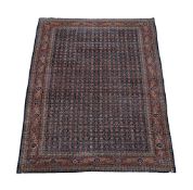 A PERSIAN FERAGHAN CARPET