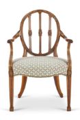 A GEORGE III CARVED MAHOGANY ARMCHAIR, DESIGN BY JAMES WYATT, CIRCA 1790
