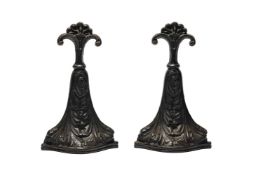 A PAIR OF VICTORIAN CAST IRON DOOR PORTERS, CIRCA 1880, BY CROSS LTD OF WEST BROMWICH