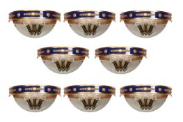 A SET OF EIGHT BLUE LACQUERED AND GILT BRASS DEMI-LUNE WALL LIGHTS, MODERN