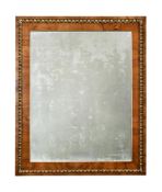 A FIGURED WALNUT AND PARCEL GILT RECTANGULAR WALL MIRROR, FIRST HALF 19TH CENTURY