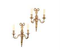 A PAIR OF GILT-BRASS TWIN-LIGHT WALL LIGHTS, IN LOUIS XVI STYLE, FIRST HALF 20TH CENTURY