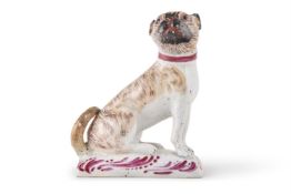 A RARE LOWESTOFT PORCELAIN MODEL OF A PUG, CIRCA 1775