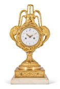 A LOUIS XVI STYLE ORMOLU MOUNTED WHITE MARBLE MANTEL CLOCK 'VASE PENDULE A DAUPHINS'