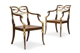 A PAIR OF REGENCY SIMULATED ROSEWOOD AND PARCEL GILT ARMCHAIRS, EARLY 19TH CENTURY