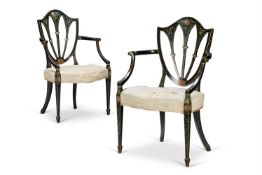 A PAIR OF GEORGE III BLACK AND POLYCHROME-PAINTED ARMCHAIRS
