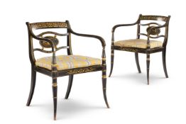 A PAIR OF REGENCY SIMULATED ROSEWOOD AND PARCEL GILT ARMCHAIRS