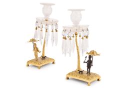 A PAIR OF FRENCH GILT BRONZE AND GLASS SET CANDLESTICKS