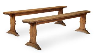 A PAIR OF FRUITWOOD TRESTLE BENCHES, 19TH CENTURY