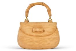 GUCCI, AN UNUSUAL GILT METAL MOUNTED SOLID CARVED WOOD DISPLAY '1947' HANDBAG