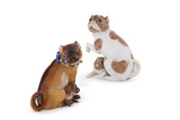 TWO DRESDEN PORCELAIN PUGS WITH PUPS