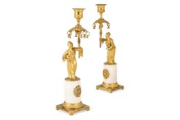 A PAIR OF FRENCH DIRECTOIRE ORMOLU AND WHITE MARBLE CHINOISERIE CANDLESTICKS