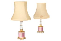 A PAIR OF GILT METAL MOUNTED PORCELAIN TABLE LIGHTS