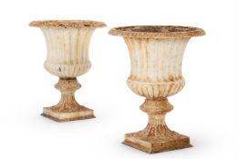 A LARGE PAIR OF CAST IRON GARDEN URNS