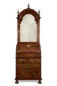 A WALNUT BUREAU CABINET, EARLY 18TH CENTURY AND LATER