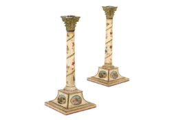 A PAIR OF LATE GEORGE III TOLE PEINTE CANDLESTICKS IN THE MANNER OF MATTHEW BOULTON