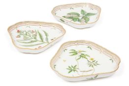 A GROUP OF THREE ROYAL COPENHAGEN FLORA DANICA PORCELAIN SHAPED TRIANGULAR DISHES
