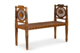 AN EDWARDIAN POLYCHROME PAINTED SYCAMORE AND CANED WINDOW SEAT