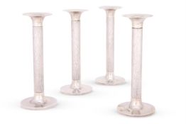 GERALD BENNEY (1930-2008), A SET OF FOUR SILVER CANDLESTICKS