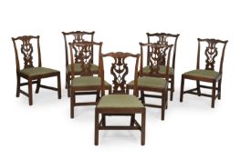 A SET OF SEVEN GEORGE III MAHOGANY DINING CHAIRS, PROBABLY IRISH, CIRCA 1770