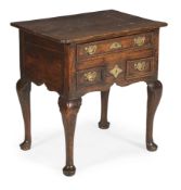 A GEORGE II OAK LOWBOY OR SIDE TABLE, CIRCA 1730