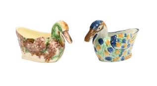 A STAFFORDSHIRE CREAMWARE SAUCEBOAT MODELLED AS A DUCK OF WHEILDON TYPE, WITH ANOTHER SIMILAR