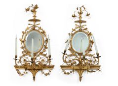 A PAIR OF GILTWOOD AND COMPOSITION MIRROR BACK WALL APPLIQUES, 19TH CENTURY