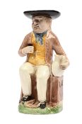 A STAFFORDSHIRE CREAMWARE 'SAILOR' TOBY JUG OF RALPH WOOD TYPE, LATE 18TH CENTURY
