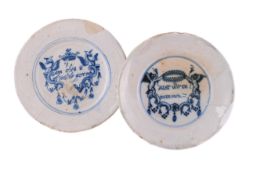TWO SIMILAR DUTCH DELFT BLUE AND WHITE SO-CALLED 'MERRYMAN' PLATES, LATE 17TH CENTURY